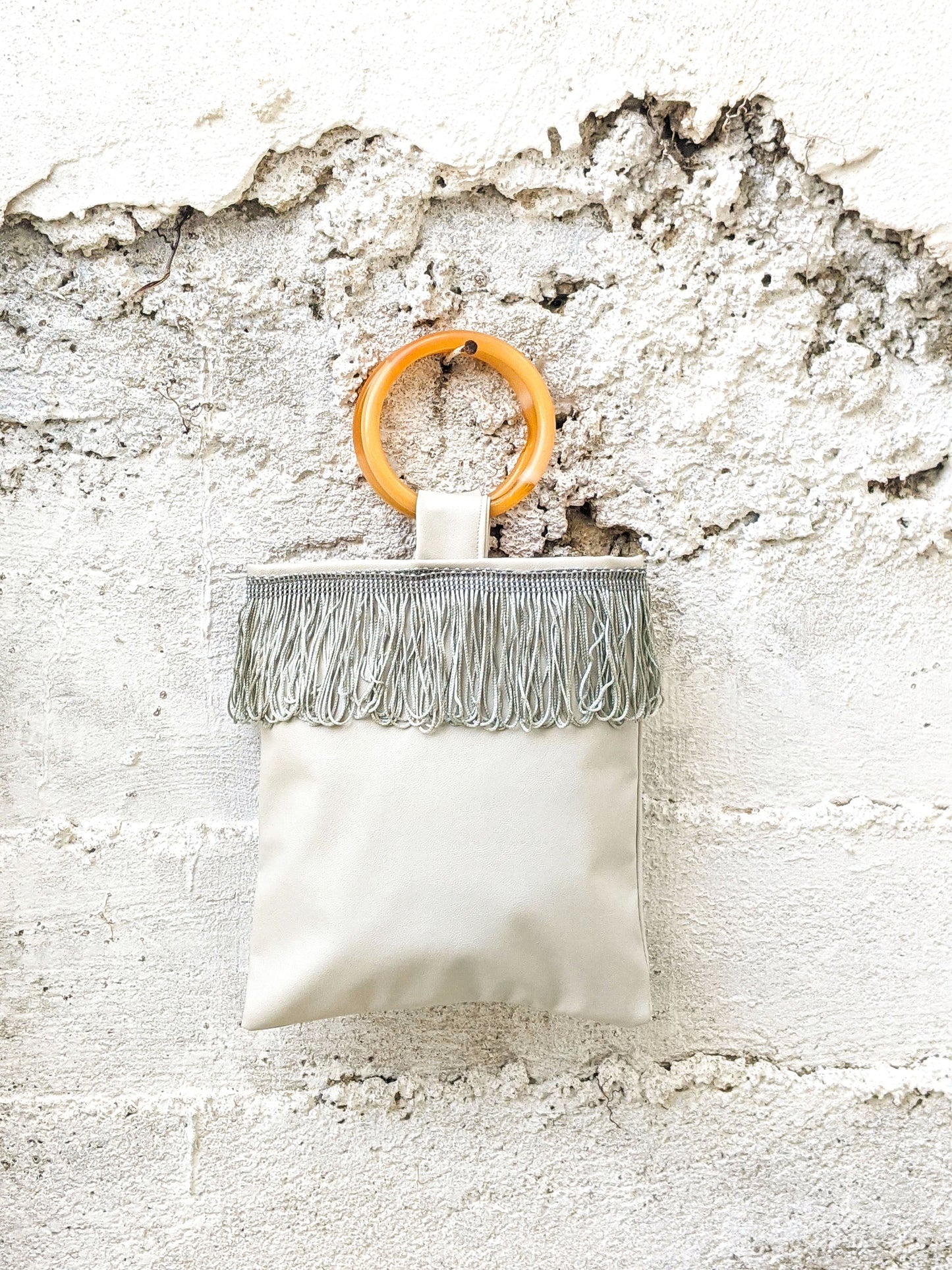 Light Grey Mini Faux Leather Bag with Amber Resin Handles and Fringe Detailing