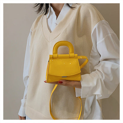 GlosséMini™ – Patent Leather Shine Bag