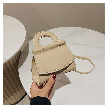GlosséMini™ – Patent Leather Shine Bag