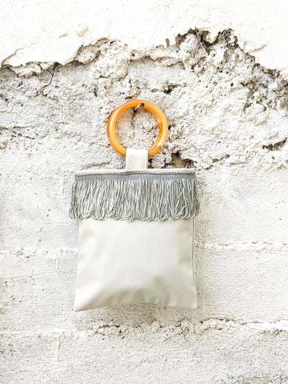 Light Grey Mini Faux Leather Bag with Amber Resin Handles and Fringe Detailing